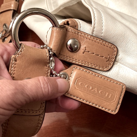 COACH PURSE. Bone colored with tan trim. Pleated. Back slip pocket. Clean inside - Picture 8 of 10